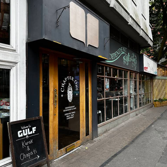 Café exterior front side, a door entrance and window