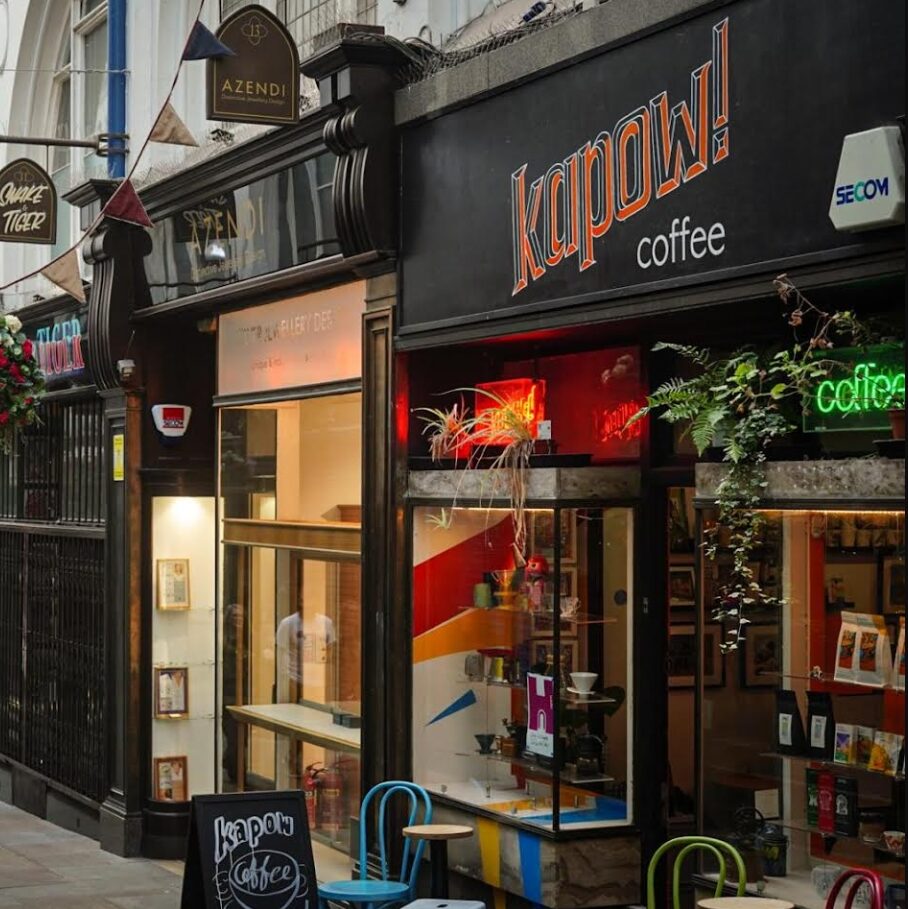 Café exterior front side in a shopping arcade.
